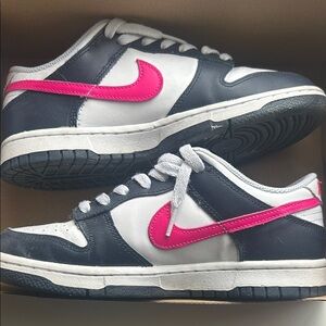 Nike dunks in White and Navy with Pink Swoosh